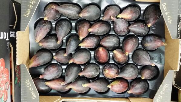 black figs in cardboard box
