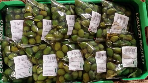 green olives in plastic bags